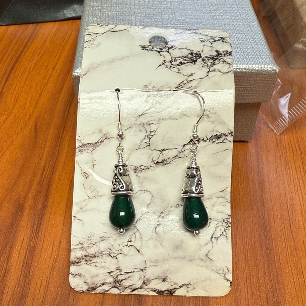 Green Jade 925 Silver Dangle Earrings. Perfect for any occasion.